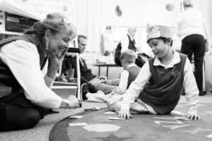 Christ Episcopal School student playing with grandparent on grandparents and special friends day