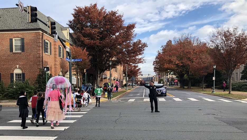 Christ Episcopal School students crossing the street on Halloween