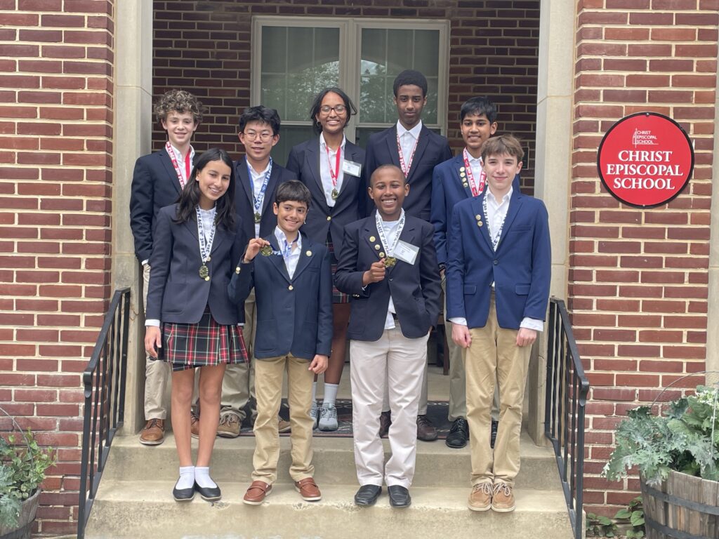 Christ Episcopal School students proudly showing off their medals from the 2025 MAESA Scholars Fair
