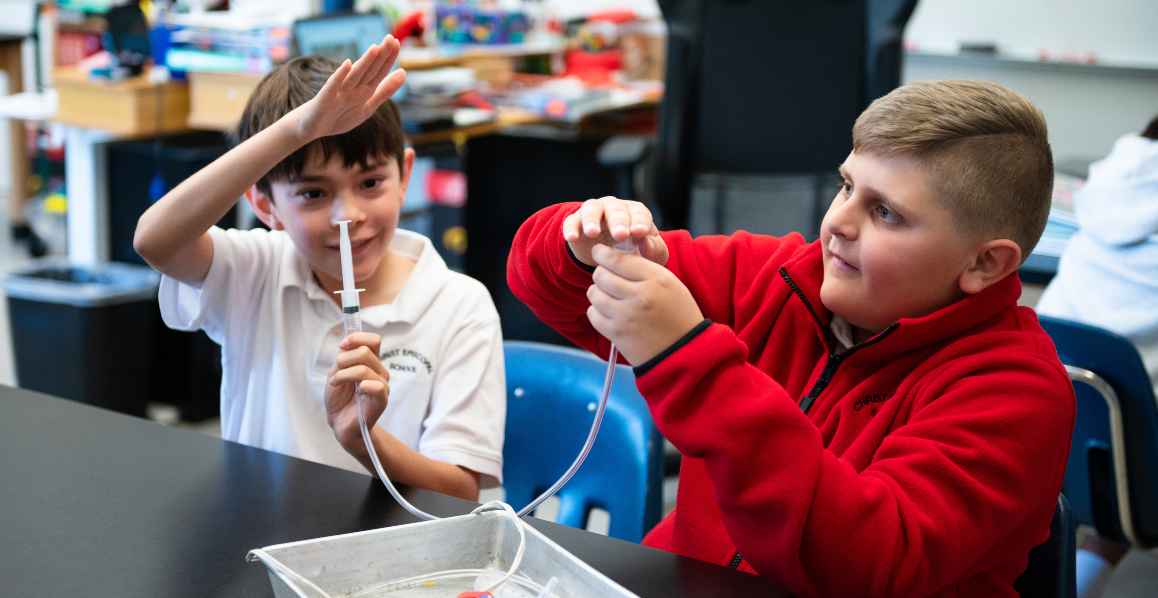 Christ Episcopal School students working together on a science project