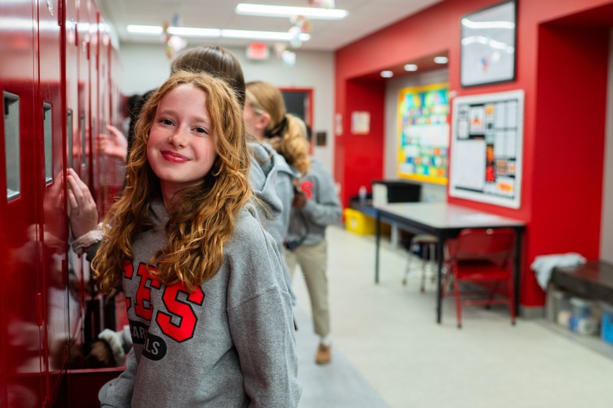 Christ Episcopal School middle school students in the hallway at their lockers between classes